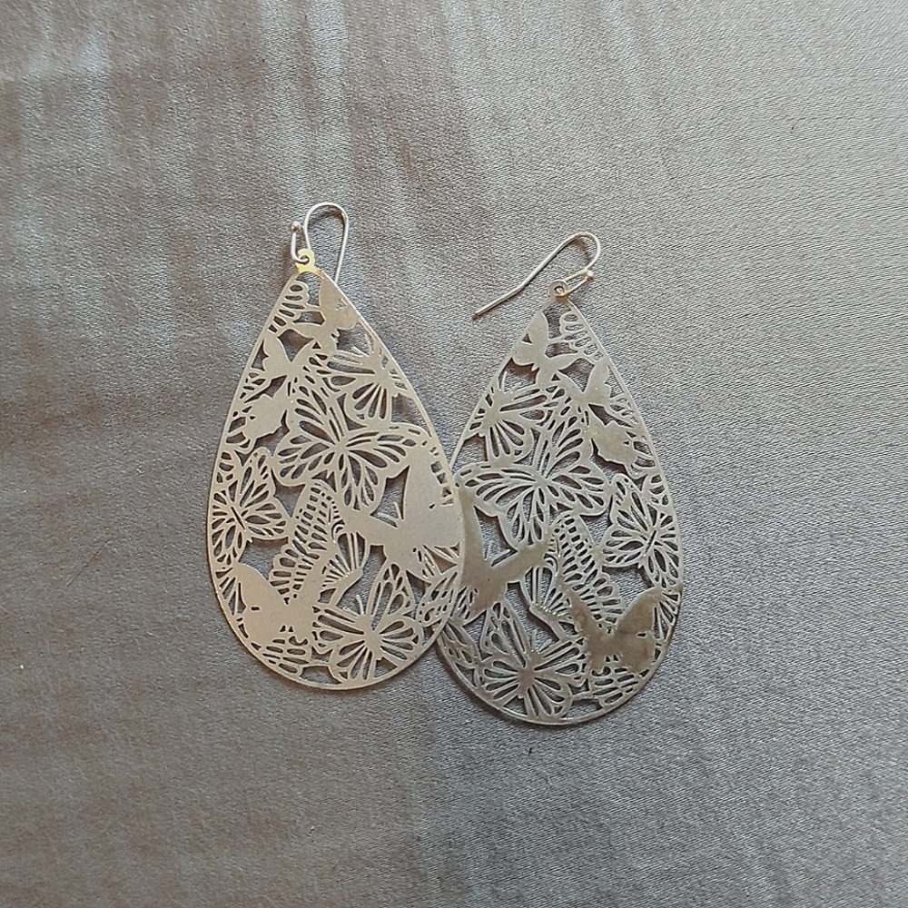 Silver metal butterfly cut out earrings